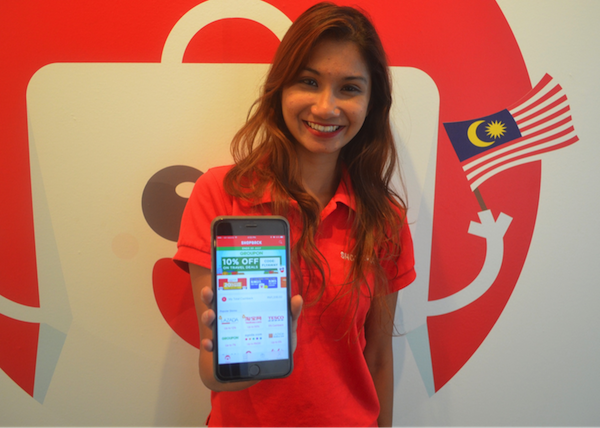 Sharmeen Looi, COO of ShopBack Malaysia, the top Cashback platform in Malaysia, showcases the Android version of ShopBack mobile app