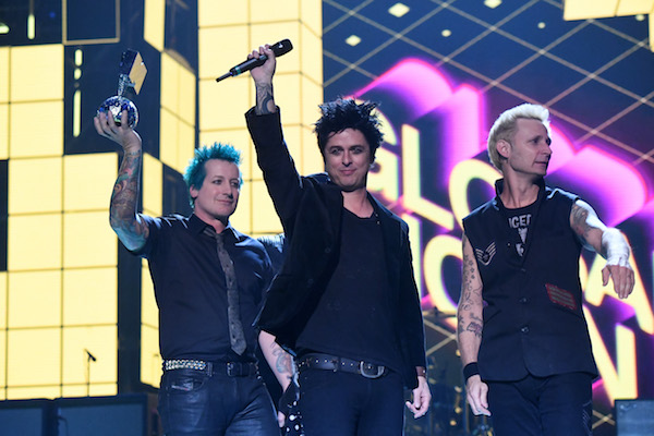 ROTTERDAM, NETHERLANDS - NOVEMBER 06:  (L-R) Tre Cool, Billie Joe Armstrong and Mike Dirnt of Green Day accepts Global Icon award on stage at the MTV Europe Music Awards 2016 on November 6, 2016 in Rotterdam, Netherlands.  (Photo by Jeff Kravitz/FilmMagic)